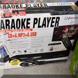 E10. Emerson Karaoke Player - $38 